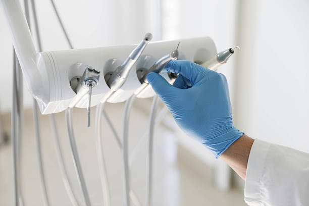 Professional Tooth Extraction technician working in Oakton, VA